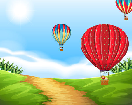 Hot air balloon in nature landscape