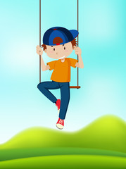 A boy playing on swing