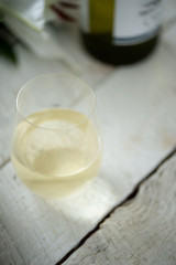 white wine on white wood