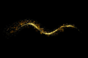 Gold glitter particles lights trail and bokeh on a black background. Abstract line sparkle texture. © kaisorn