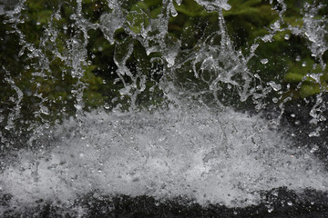 water splashing from a water fall