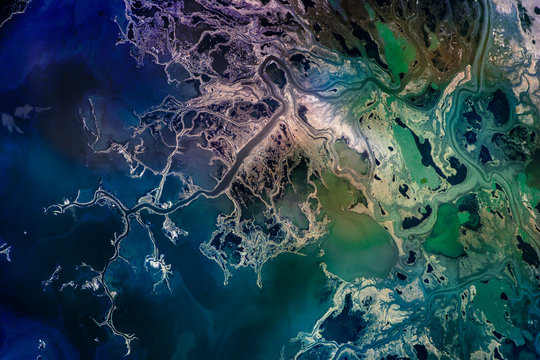 Saskatchewan River Delta, Manitoba, Canada. Satellite view. Colorful collage. Elements of this image are furnished by NASA. © elen31