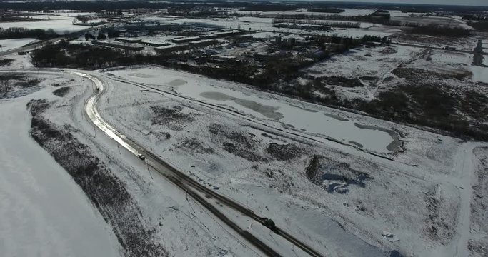 Flying Towards Road Separating Two Ponds