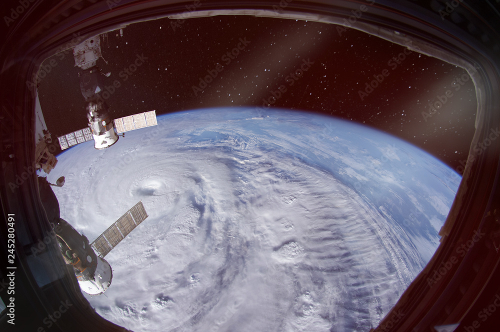 Canvas Prints hurricane is seen from spaceship porthole. the elements of this image furnished by nasa.