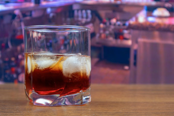 Americano cocktail in tumbler glass with ice