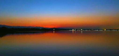 beautiful sunrise along side water