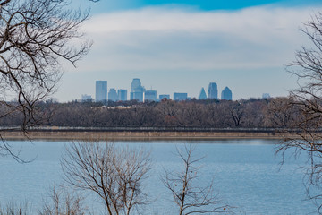 Fototapeta premium Dallas Arbitorium and Botanic Garden in Winter. The Dallas Skyline in the distance