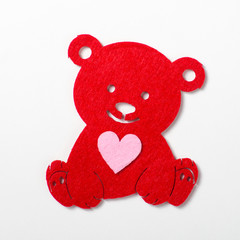 red bear with heart on white background, valentine's day concept