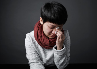 Beautiful Asian woman expressing emotions to the camera