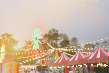 Zelfklevend Fotobehang Blurred Background Image of Weekend Market Festival with Colorful Light Decorations © masummerbreak
