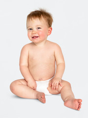 Cheerful baby in a studio