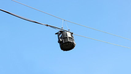 Black lighting hanging on a line