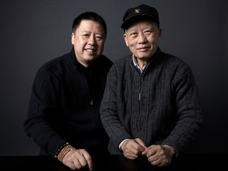 Portraits of Asian Chinese characters, father and son. indoors