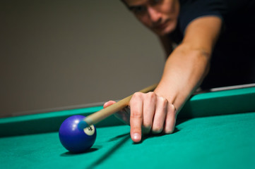 play billiards. cue and billiard balls.