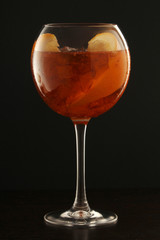 A glass with aperol spritz cocktail	