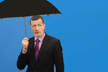 Businessman with umbrella