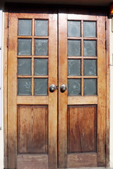 A tight-closed wooden door