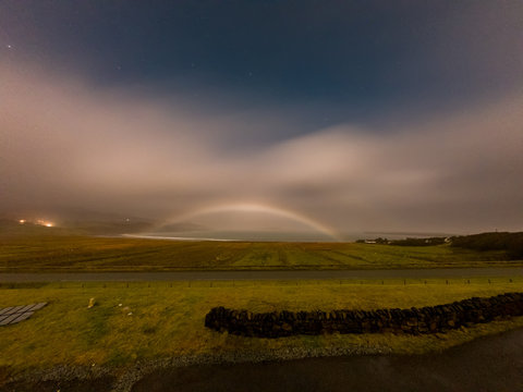 Very rare moonbow during the night above Staffin bay
