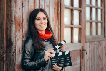 Young Actress Holding Cinema Board Waiting to Film