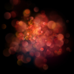 Abstract defocused circular red bokeh on dark background. EPS 10