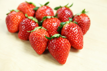 strawberry on wood table from top view