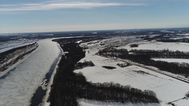 flight kopter spring river snow ice cloudy day