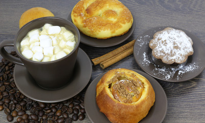 cup of coffee with beans and marshmallow