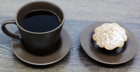 cup of coffee and cookies on wooden table