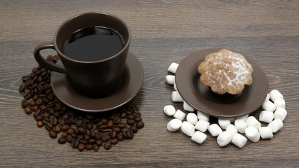 cup of coffee with beans and marshmallow