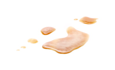 Spilled beer puddle with foam isolated on white background and texture
