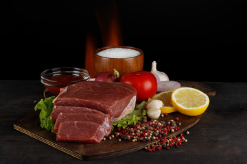 meat slices with spices background
