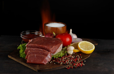 meat slices with spices background