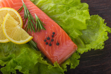 slice of salmon with spices background