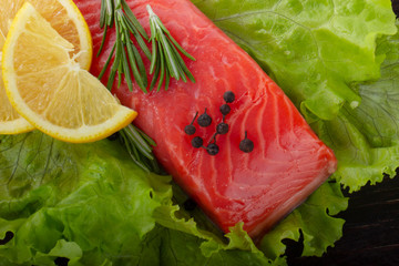 slice of salmon with spices background