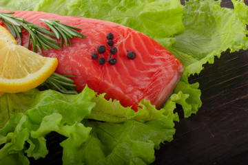 slice of salmon with spices background