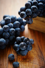 grapes on wooden table