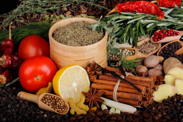 spices and herbs on wooden background