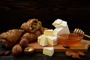 slices of cheese brie or camembert with croissants