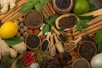 various spices on wooden background