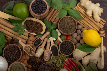 various spices on wooden background