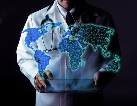 Doctor using tablet pc with virtual screen with world map. Internet health care  ,Social network ,Digital world graphic and technology global .