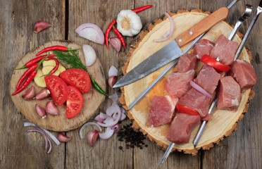 shashlik ingredients on wooden background