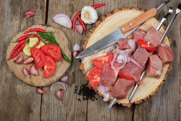 shashlik ingredients on wooden background
