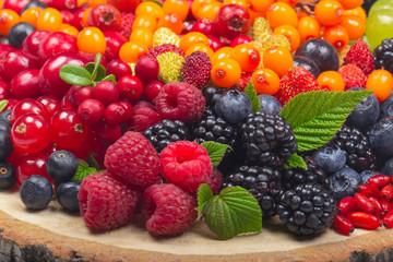 heap  of berries on wooden stub