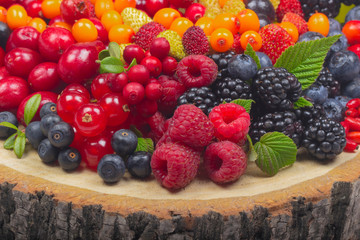 heap of berries on wooden stub