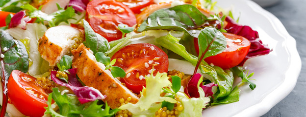 Fresh vegetable salad with grilled chicken meat