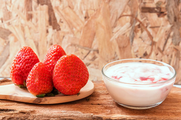 Freshness Various sweet red strawberries with yogurt strawberry  on wooden background,