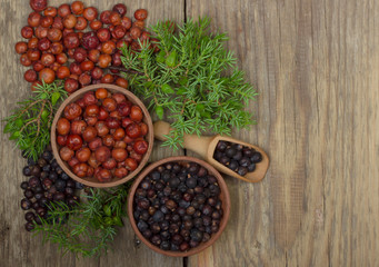 heap of red and black juniper berries background