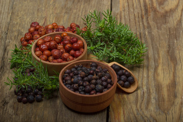 heap of red and black juniper berries background