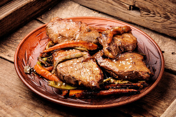 Beef steaks with vegetables